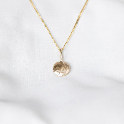 gold impression necklace