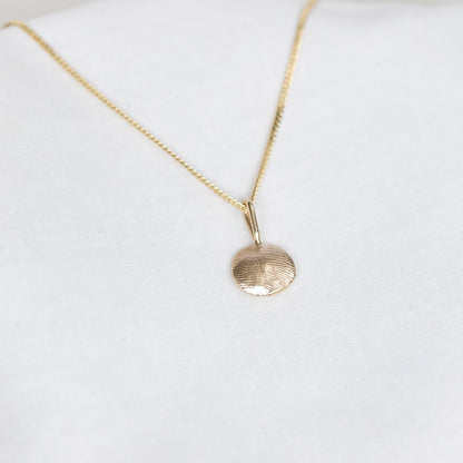 gold impression necklace