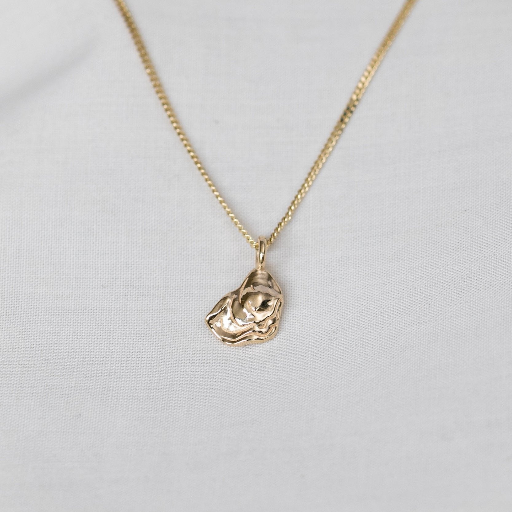 solid gold oyster necklace